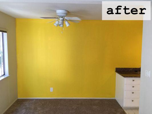 how the walls looked after priming + painting ... awesome job covering up 2 different colors