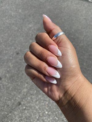 French tip almond shaped acrylic nails by Pauley. Not too thick, just how i like it.