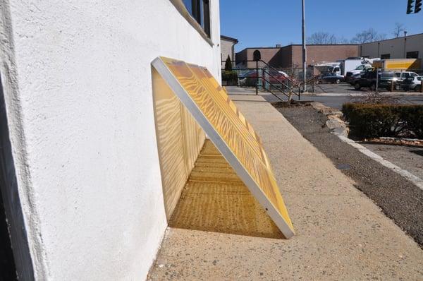 Freshly exposed screens drying in the early spring air.