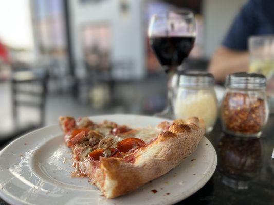 Meat lover's pizza and Chianti