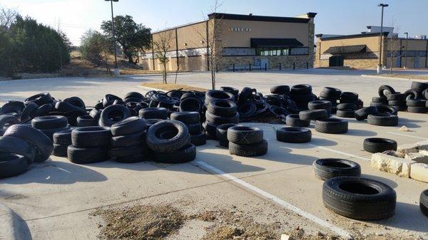 These tires have been in the back parking lot for months. Rahim Marediya has invaded Copperfield Nature Trail's environmental destruction.