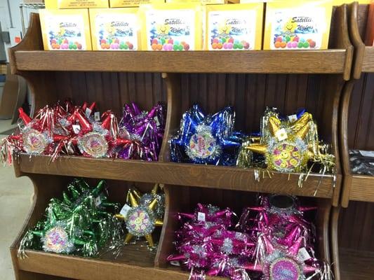 Small piñatas in bins and large ones also hang from the ceiling.