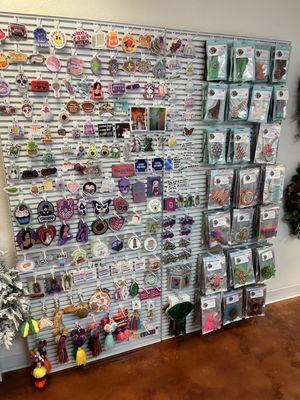 Wall of stickers and car scents