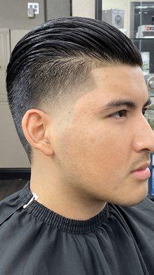 Slick back taper fade.