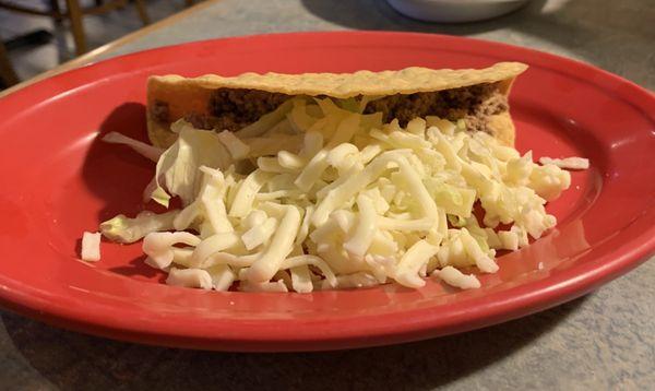 Ground Beef Taco ..one scoop of bland meat and cheese. Where is the lettuce and tomato??