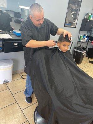 My son getting a fresh cut by Jaime