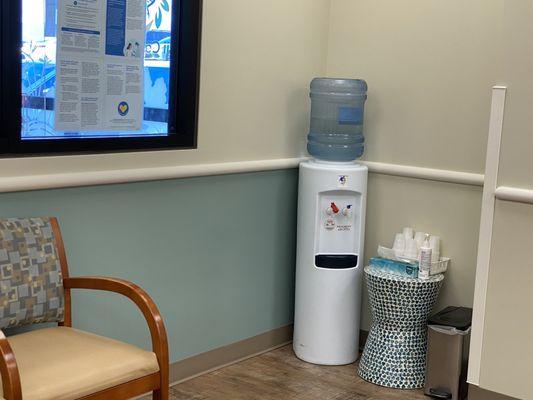 Waiting area.. look how clean and provides refreshing water for their patients.