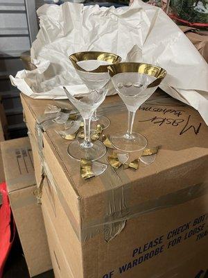 22K gold and crystal champagne glasses. They were loosely packed together.