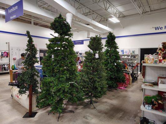 Lots of Christmas trees for sale!! All looked brand new just needs some fluffing!