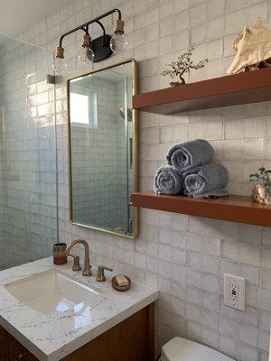 creative floor to ceiling tile for guest bathroom