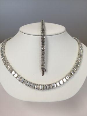 Featured Jewelry: 18k white gold and emerald cut diamond riviera necklace and matching emerald cut diamond bracelet.