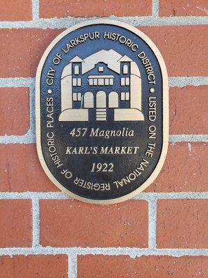 Historical marker on the building.