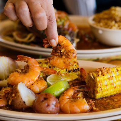 Mambo Style Shrimp with potatoes & corn