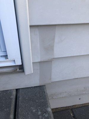 Re-installed siding misplaced to hide more broken siding