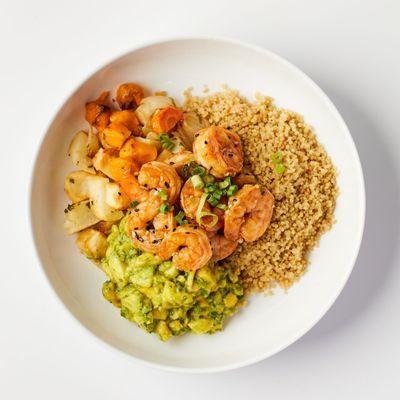 Grilled shrimp protein bowl with organic veggies and carb of choice.