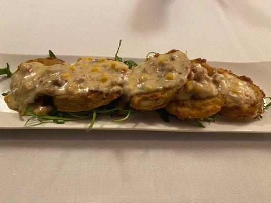 Fried green tomatoes appetizer.  Great and different topping.