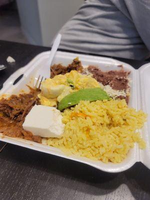 Food from the hot bar the shredded pork was delicious. Rice and potato salad was ok