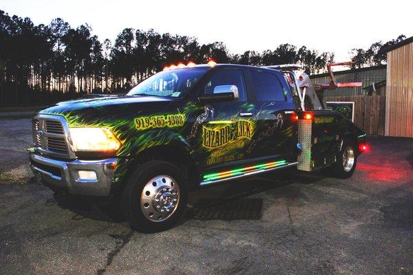 Custom lighting package on a tow truck for Lizard Lick Towing.