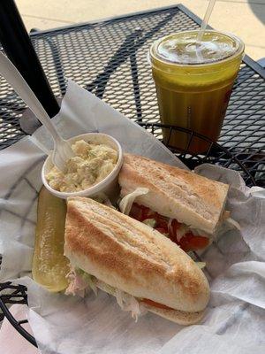 The ultimate Turkey sandwich with potato salad and a pickle combo