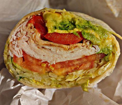 Turkey Wrap with Lettuce, Tomato, Avocado & Roasted Red Peppers. Fantastic and huge!