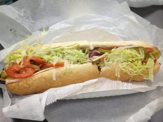 "AK's special" with three types of meat.  This thing is massive and he large is only $7 for a foot long.