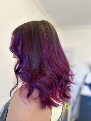 Vibrant pinks, purples and blues for this babe