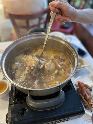 Fresh coconut (half) chicken hot pot - signature dish and worth the $46 price tag! + $1.50 side house-made sauce (not pictured)