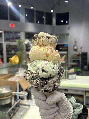 Large 3 flavor ice cream on an Oreo marshmallow cone