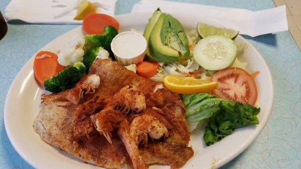 Blacken Tilapia , shrimp , vegetables and avocado