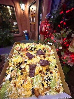 The Appetizer Supreme. A gargantuan smorgasbord of goodness! It fills a whole pizza box and weighs more than a small child!