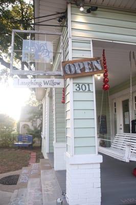 Store front and porch  decor was Christmas is July FYI!