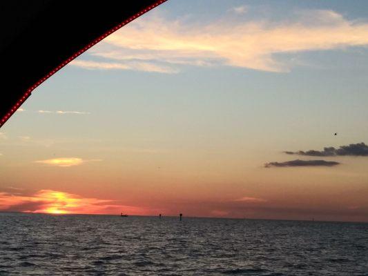 Boat lights at sunset