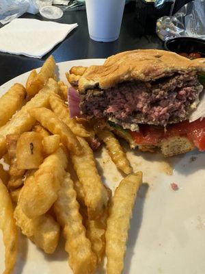 Half eaten Blue cheese burger