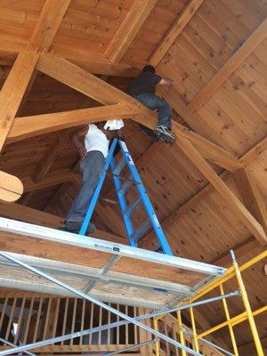 HEPA Vacuuming support beams at the completion of the mold remediation.