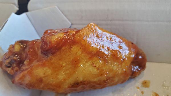 look at this beautifully fried and sauce coated wing