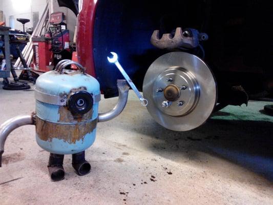 Muffler minion loves doing brakes on Dodges!