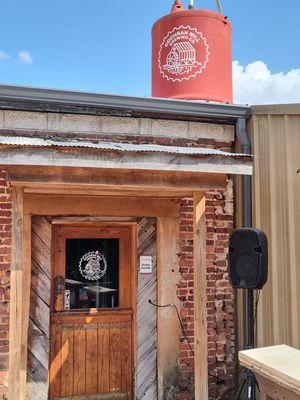 Entrance to bar and indoor seating area.