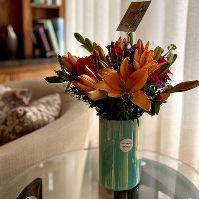 orange or yellow lilies arrangement