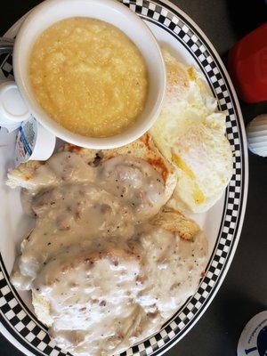 Breakfast platter with 2 eggs, 2 biscuits with sausage gravy, and cheesy grits. Yum!