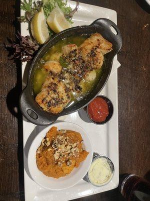 Baked Seafood Combo  A combo of cod fillets, jumbo shrimp, and sea scallops baked in seasoned butter.  And sweet potato casserole.