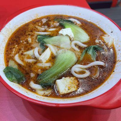 Classic mildly spicy soup with udon, beef, squid, tofu, and bok choy.