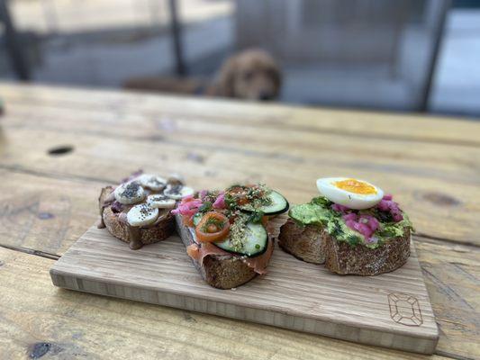 Toast flight with (left to right) ab&j, Colorado lox, and avocado toast. All amazing!