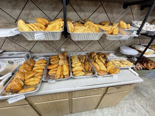 Freshly baked peroshki and chebureki