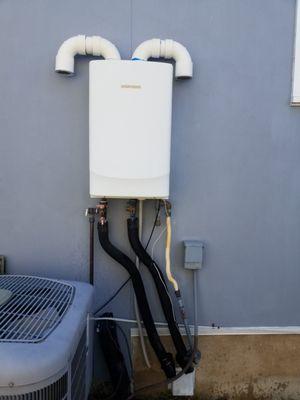 Flushing a tankless water heater in Austin