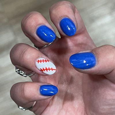 Dodgers baseball nails - blue nails with one nail that looks like a baseball.