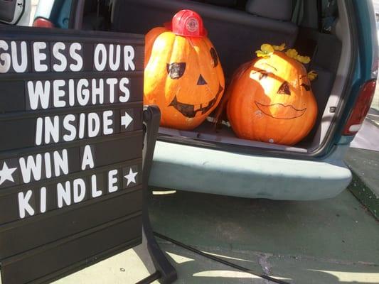 Can you guess the weight of the pumpkins.  If you can you will win a great gift.