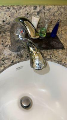 Sink faucet nasty with toothpaste. Hasn't been cleaned.