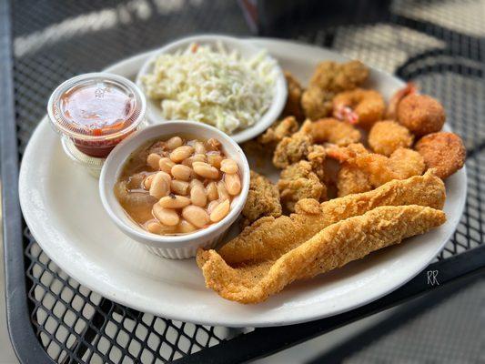 Catfish, shrimp & oysters w/great northern beans, hush puppies & slaw.