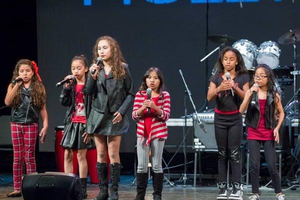 Voice students at "Decades" concert produced by Hollywood Music Studios