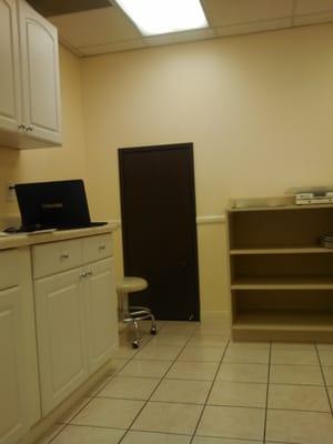 Small door in patient waiting room.  Door handle is a foot and a half off of floor.  Hmmmm... Interesting!